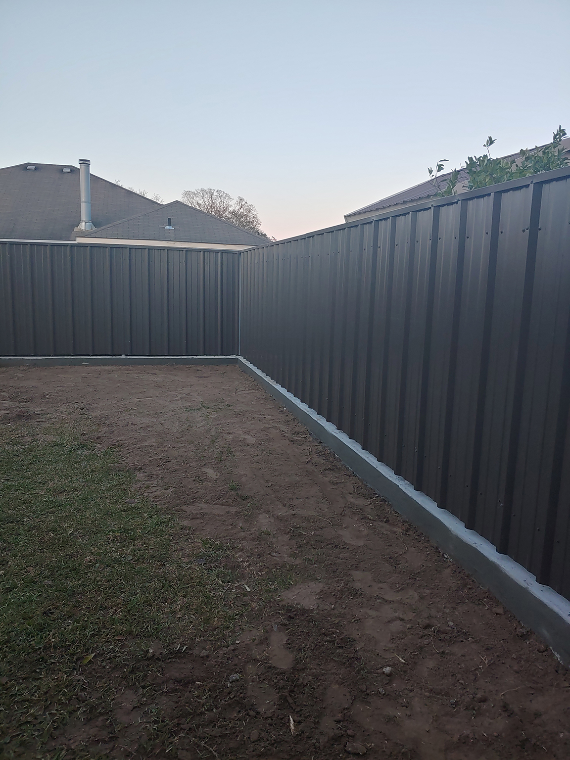 Burnished Slate R Panels used to create this fence in the New Orleans area.